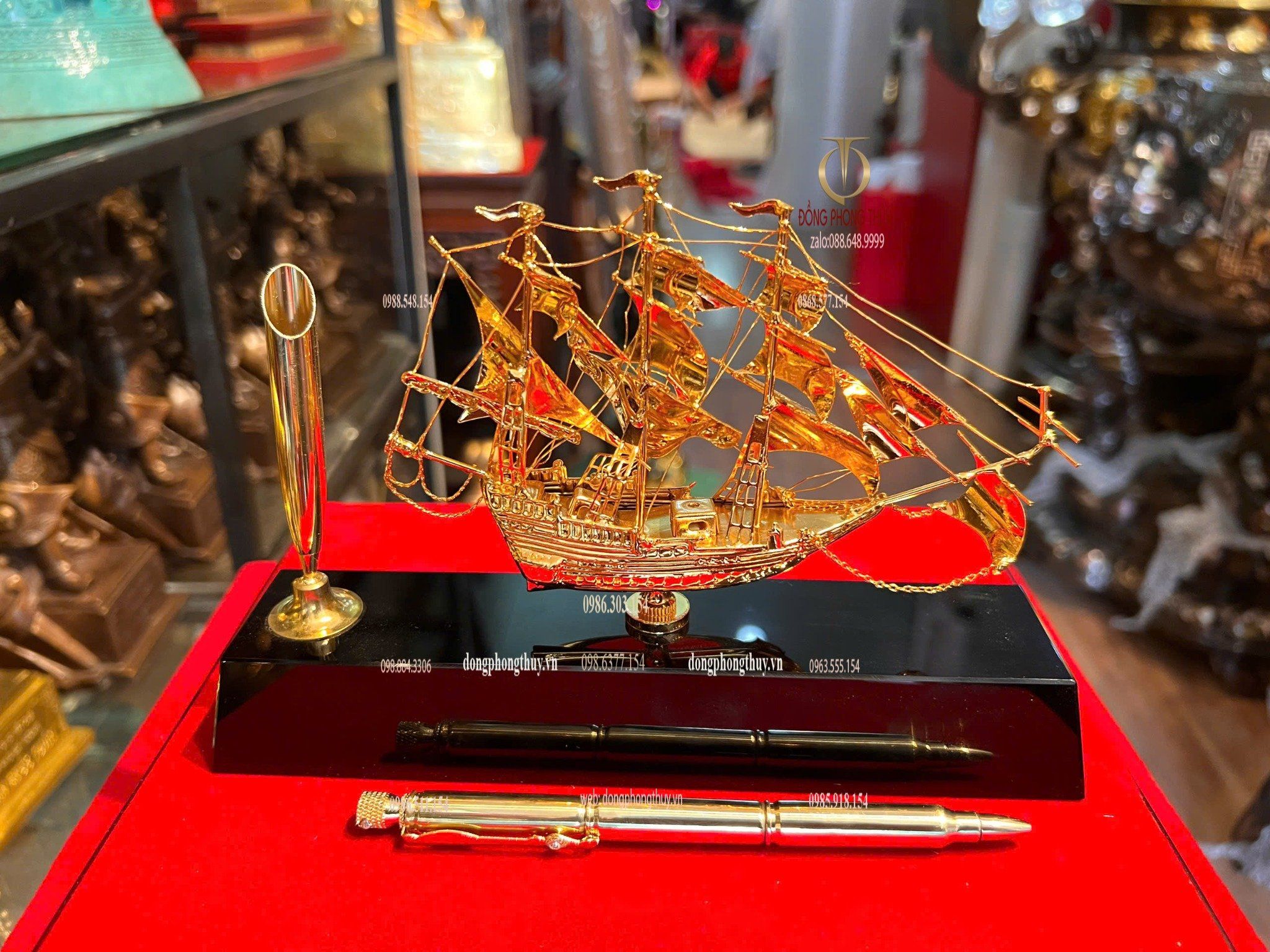 Bút ký bằng 3 viên đạn ar15 + Mô hình thuyền buồm mạ vàng 24k