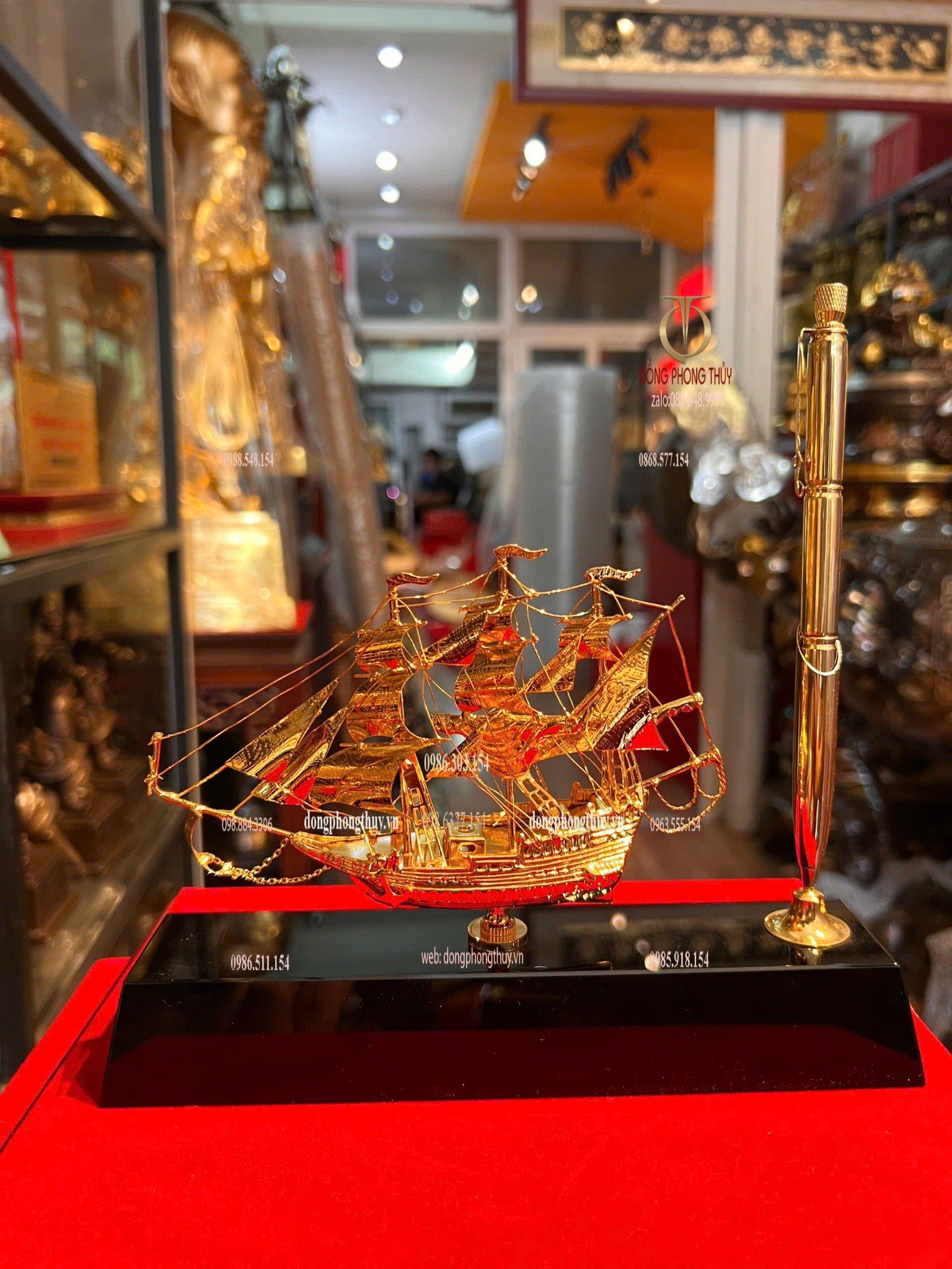 Bút ký bằng 3 viên đạn ar15 + Mô hình thuyền buồm mạ vàng 24k