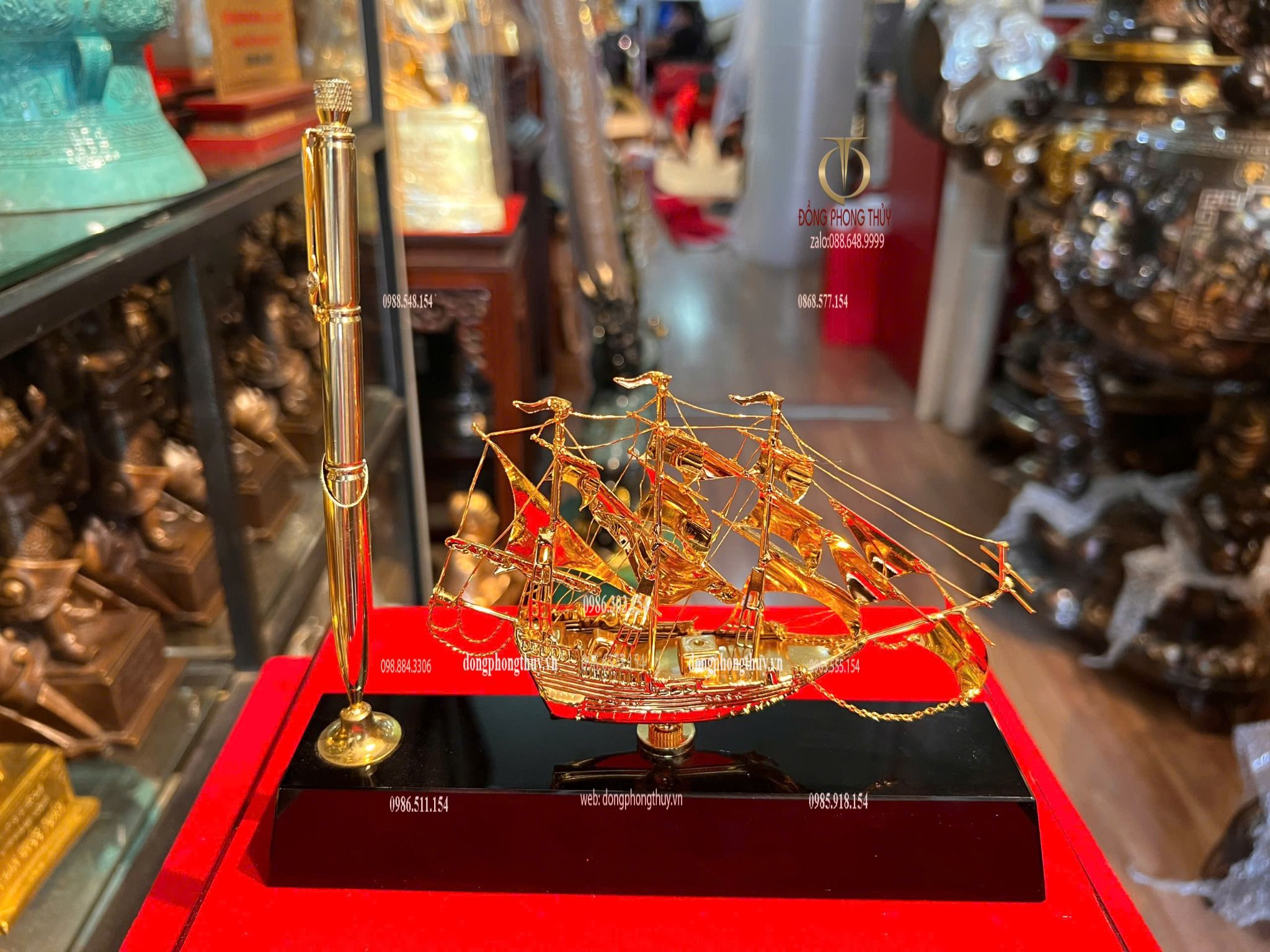 Bút ký bằng 3 viên đạn ar15 + Mô hình thuyền buồm mạ vàng 24k