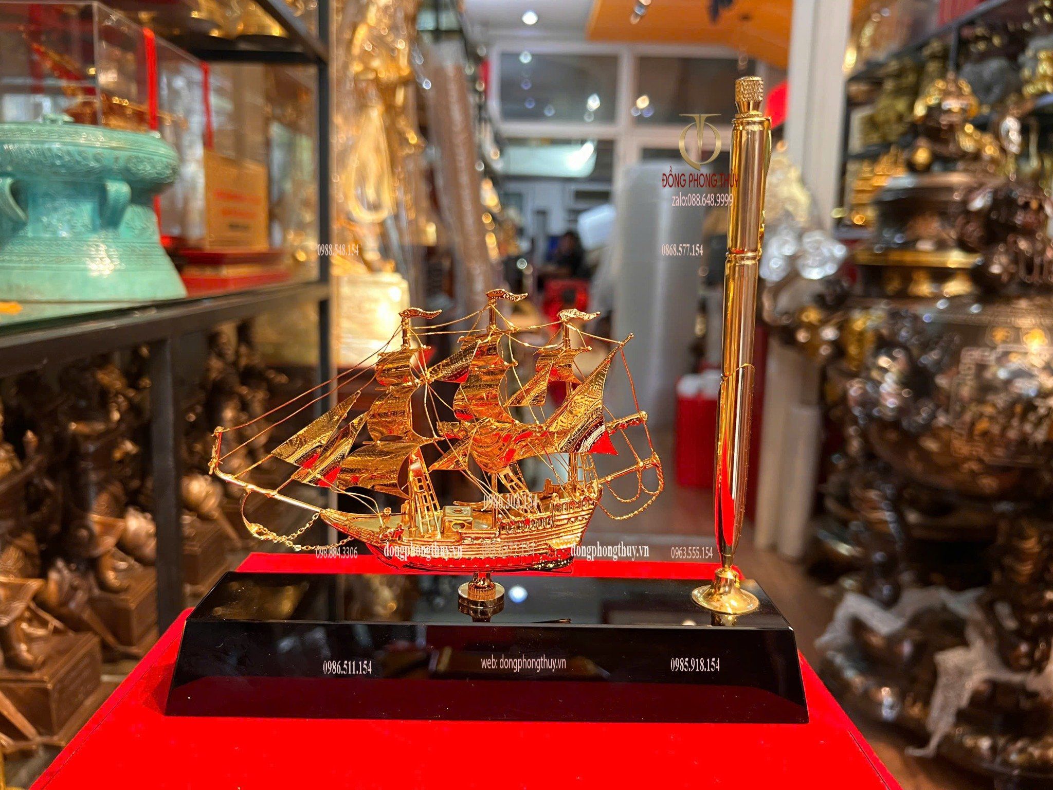 Bút ký bằng 3 viên đạn ar15 + Mô hình thuyền buồm mạ vàng 24k