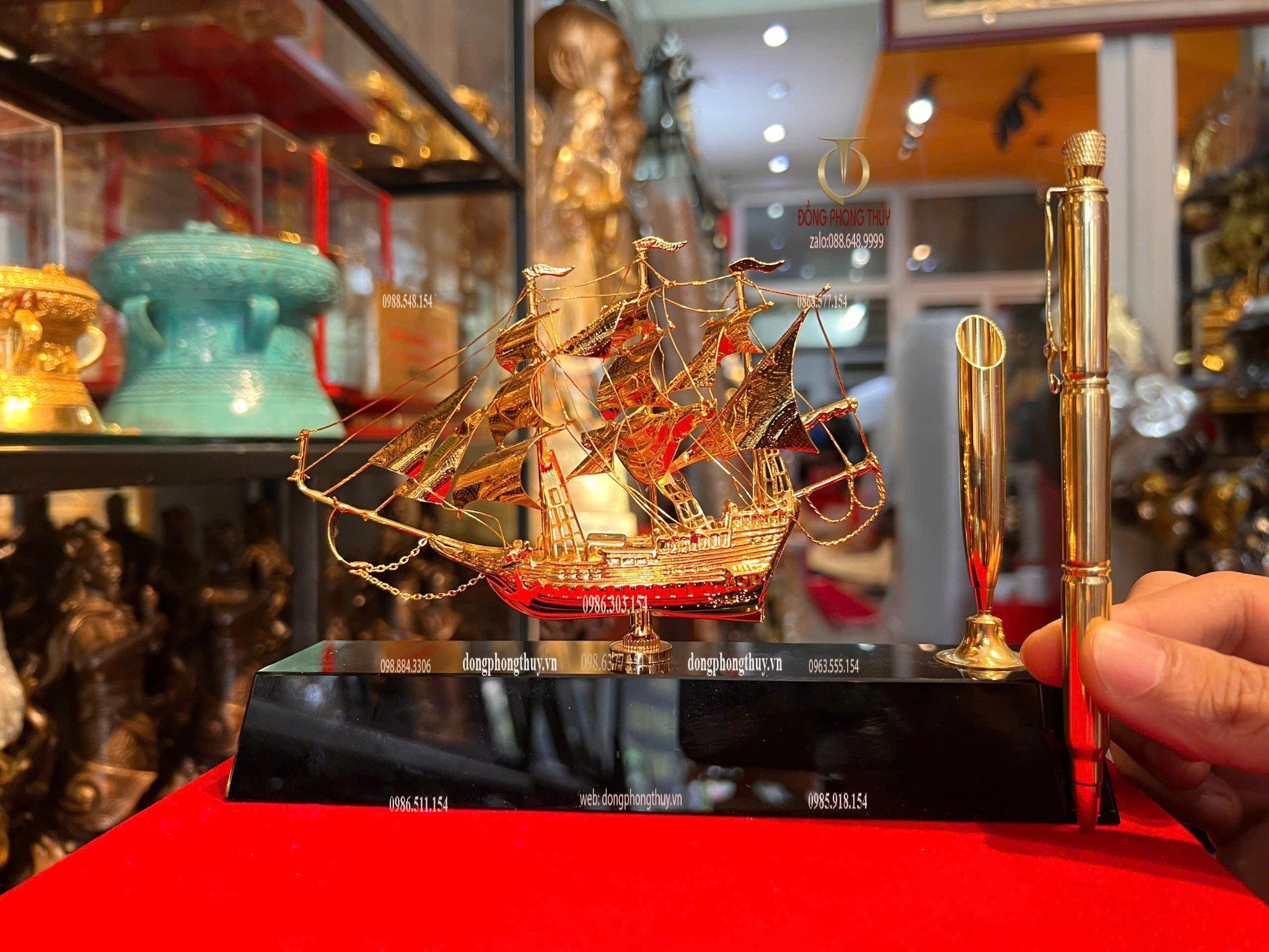 Bút ký bằng 3 viên đạn ar15 + Mô hình thuyền buồm mạ vàng 24k