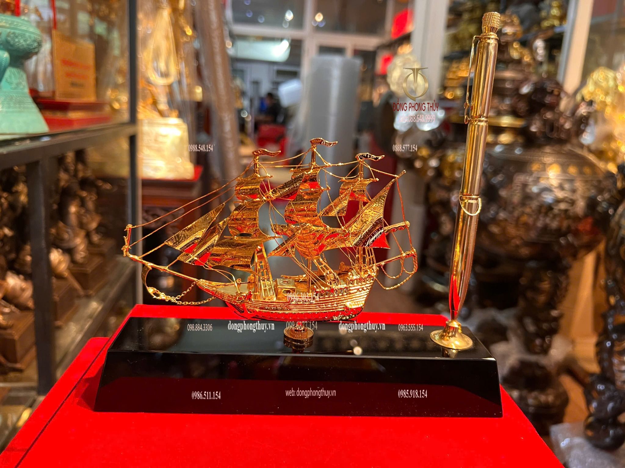 Bút ký bằng 3 viên đạn ar15 + Mô hình thuyền buồm mạ vàng 24k