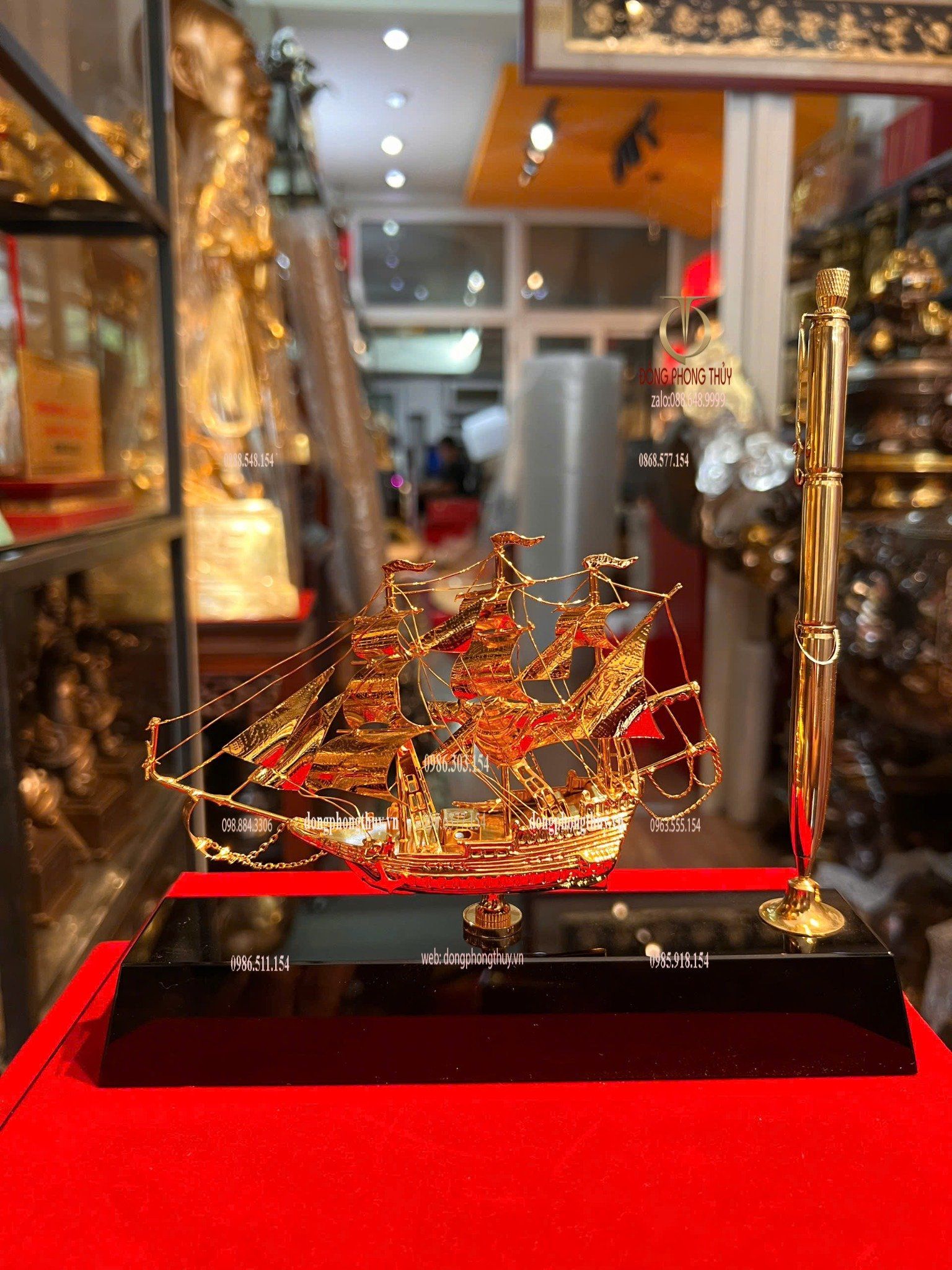 Bút ký bằng 3 viên đạn ar15 + Mô hình thuyền buồm mạ vàng 24k