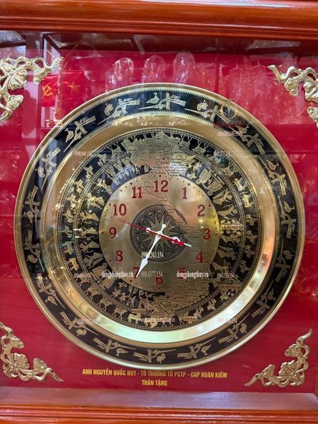 Tranh đồng hồ trống đồng