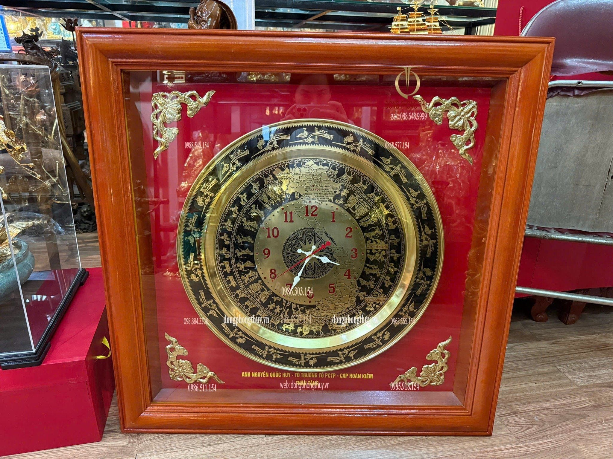 Tranh đồng hồ trống đồng