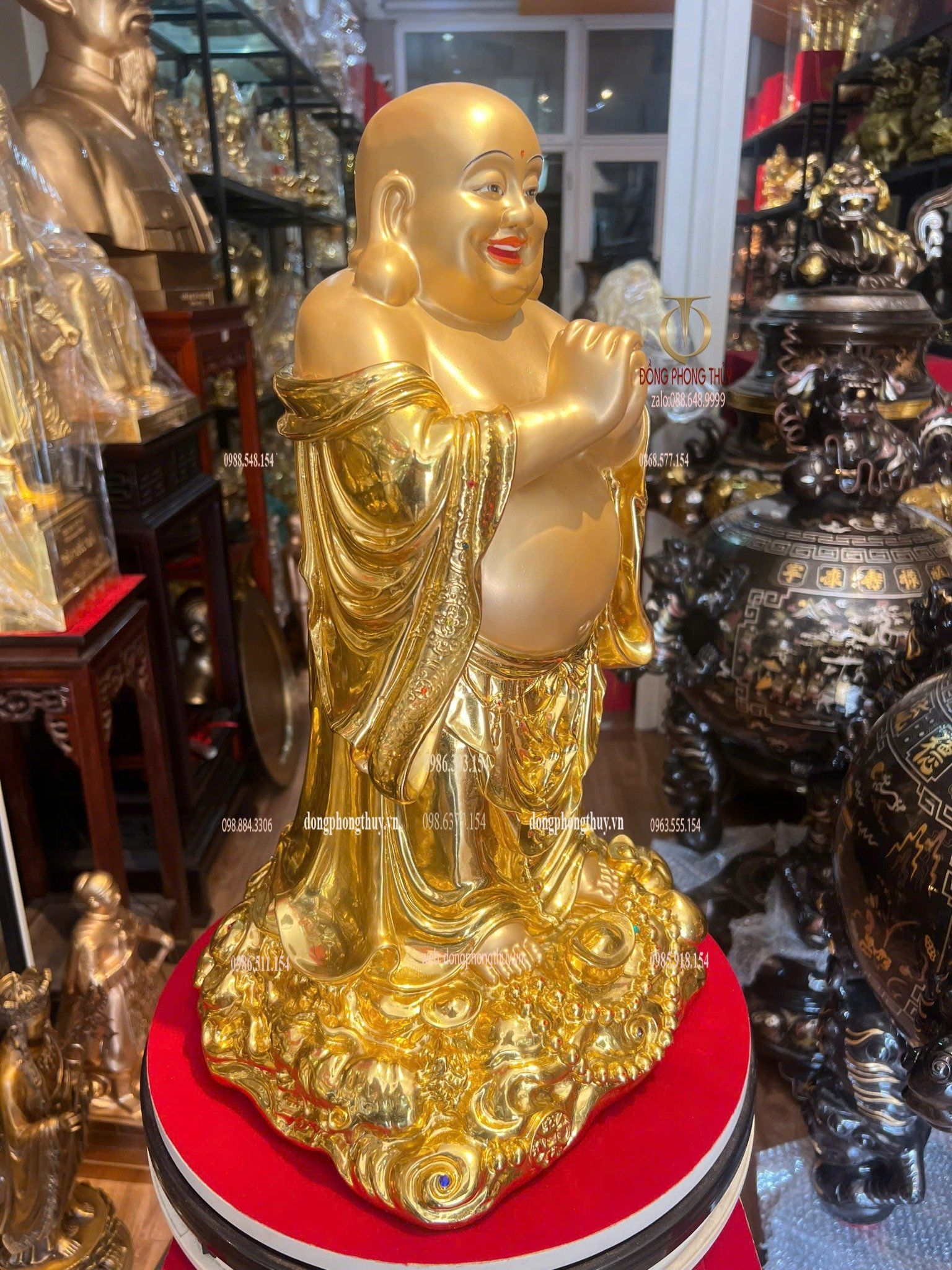 Tượng Di Lặc bằng đồng dát vàng vẽ diện