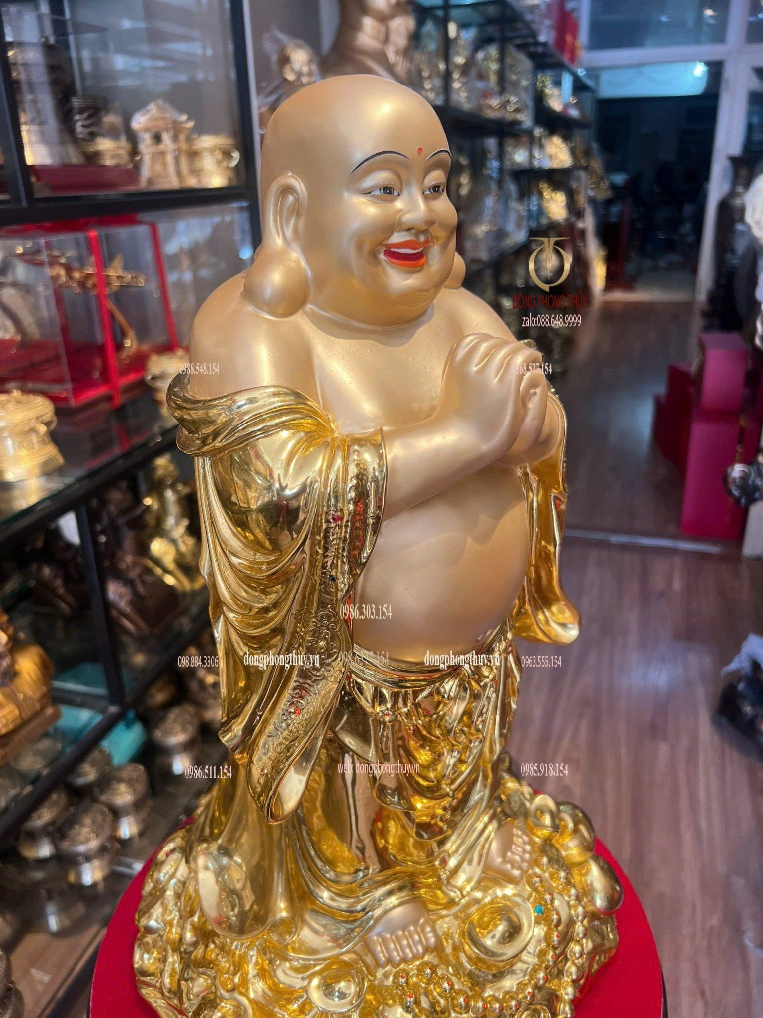 Tượng Di Lặc bằng đồng dát vàng vẽ diện
