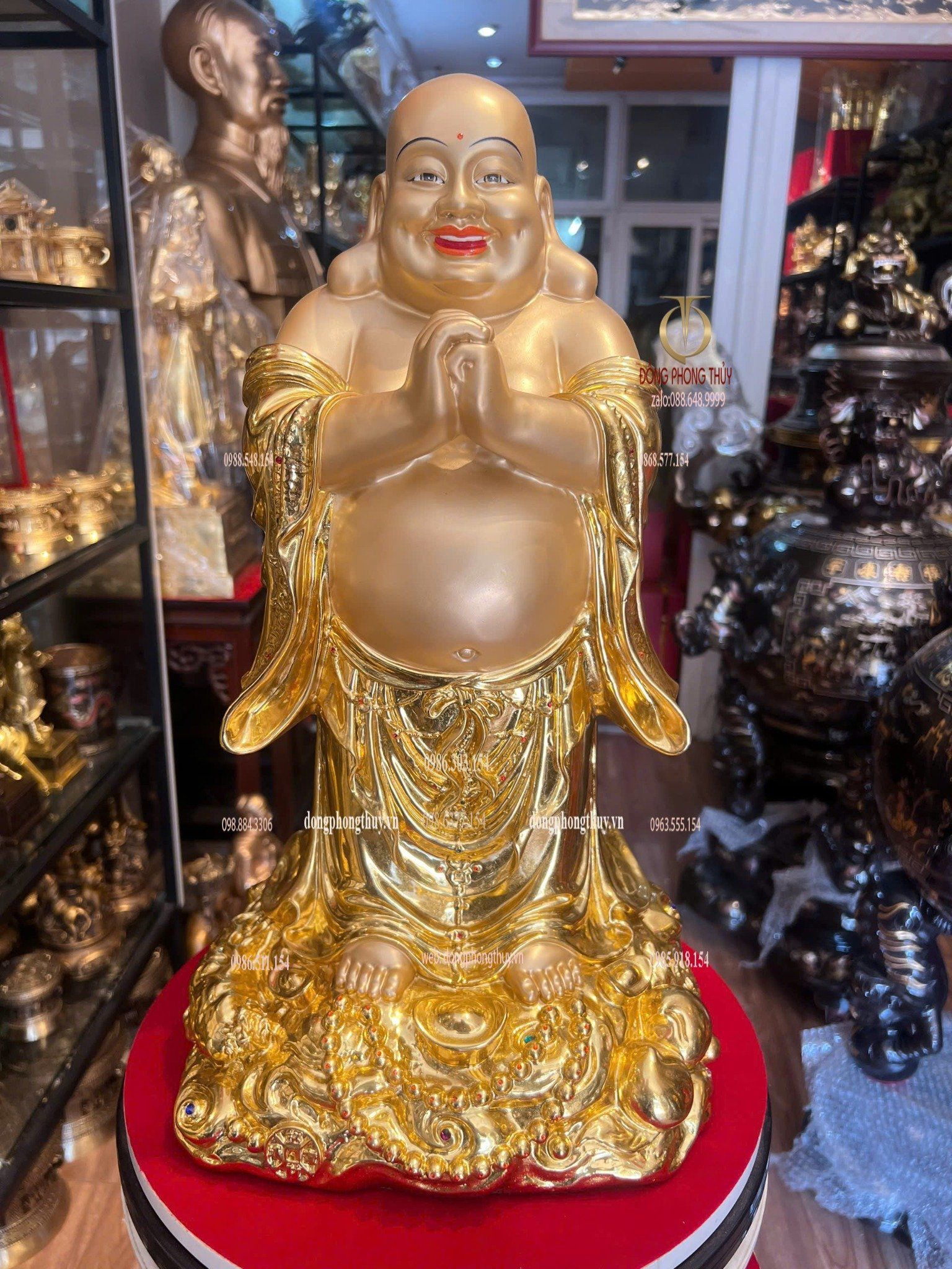 Tượng Di Lặc bằng đồng dát vàng vẽ diện
