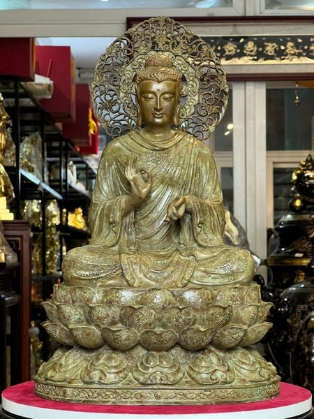 Tượng thích ca chuyển pháp luân bằng đồng patina xanh rêu