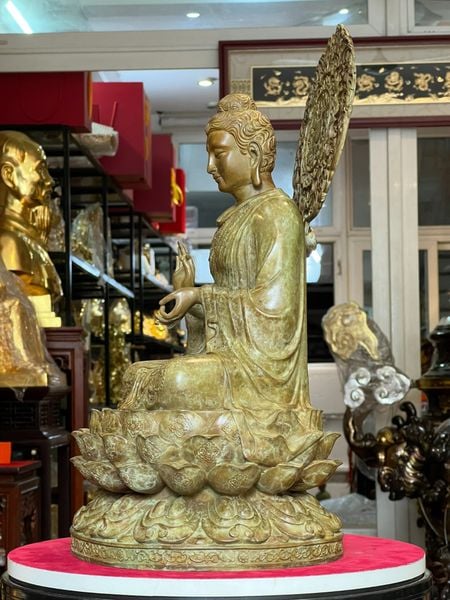 Tượng thích ca chuyển pháp luân bằng đồng patina xanh rêu
