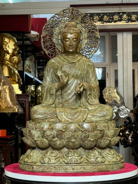 Tượng thích ca chuyển pháp luân bằng đồng patina xanh rêu