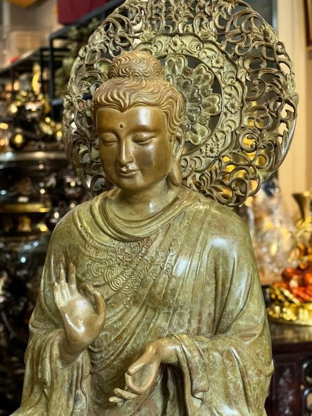 Tượng thích ca chuyển pháp luân bằng đồng patina xanh rêu
