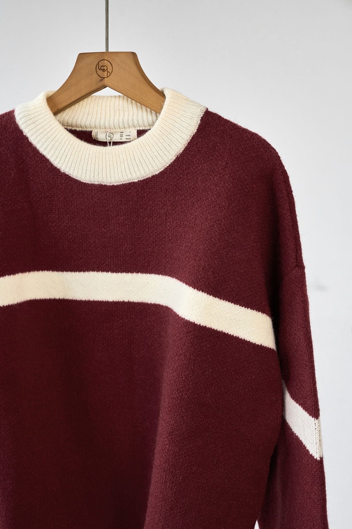 Áo len phối nơ dáng rộng - H61W25T004