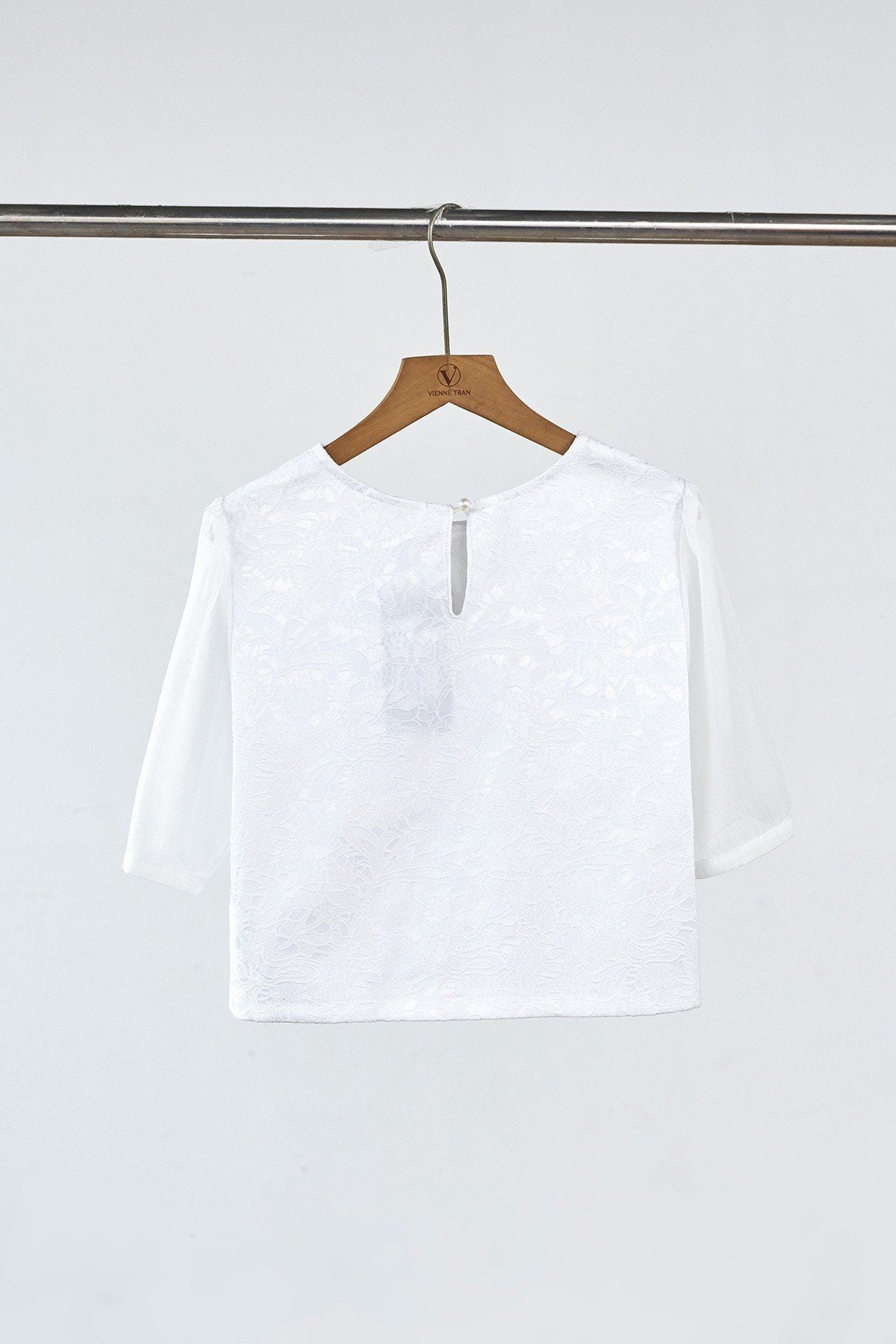 Áo croptop phối nơ và tay - L61B26Q046