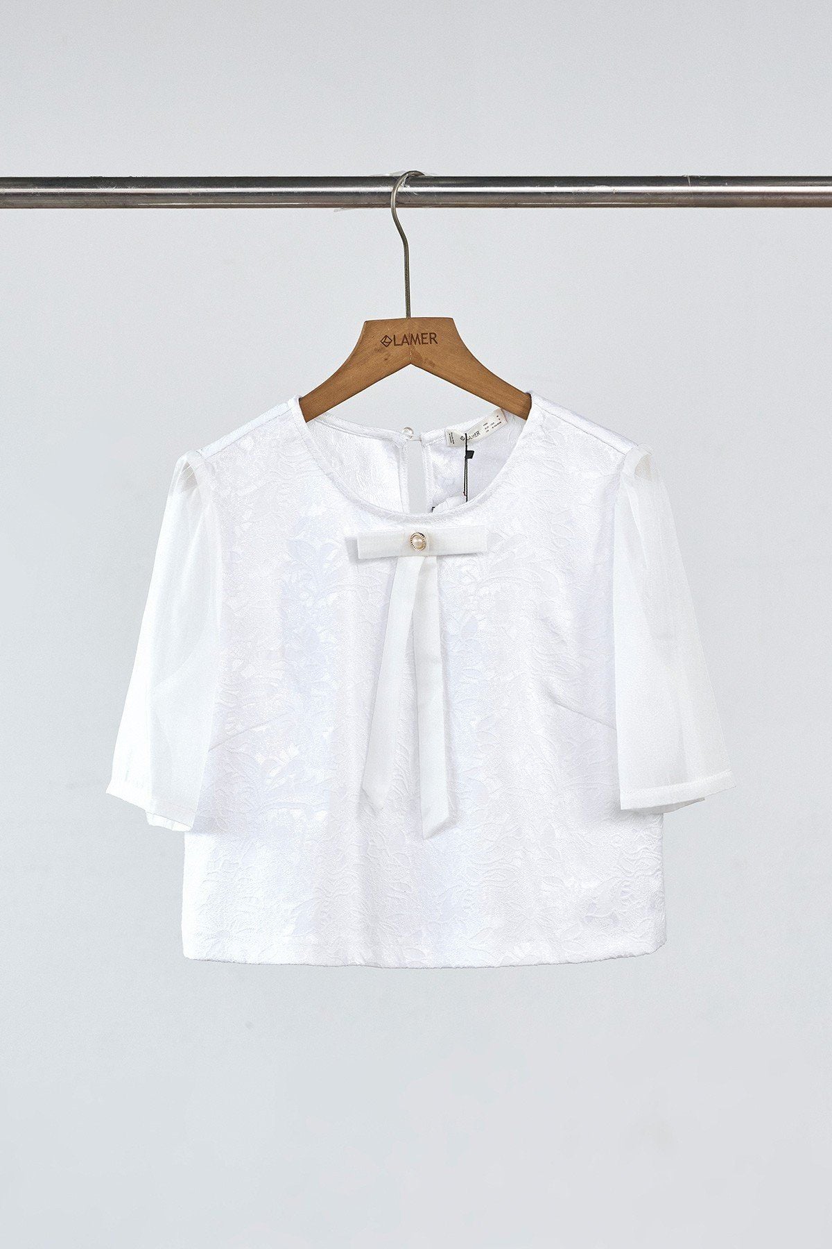 Áo croptop phối nơ và tay - L61B26Q046