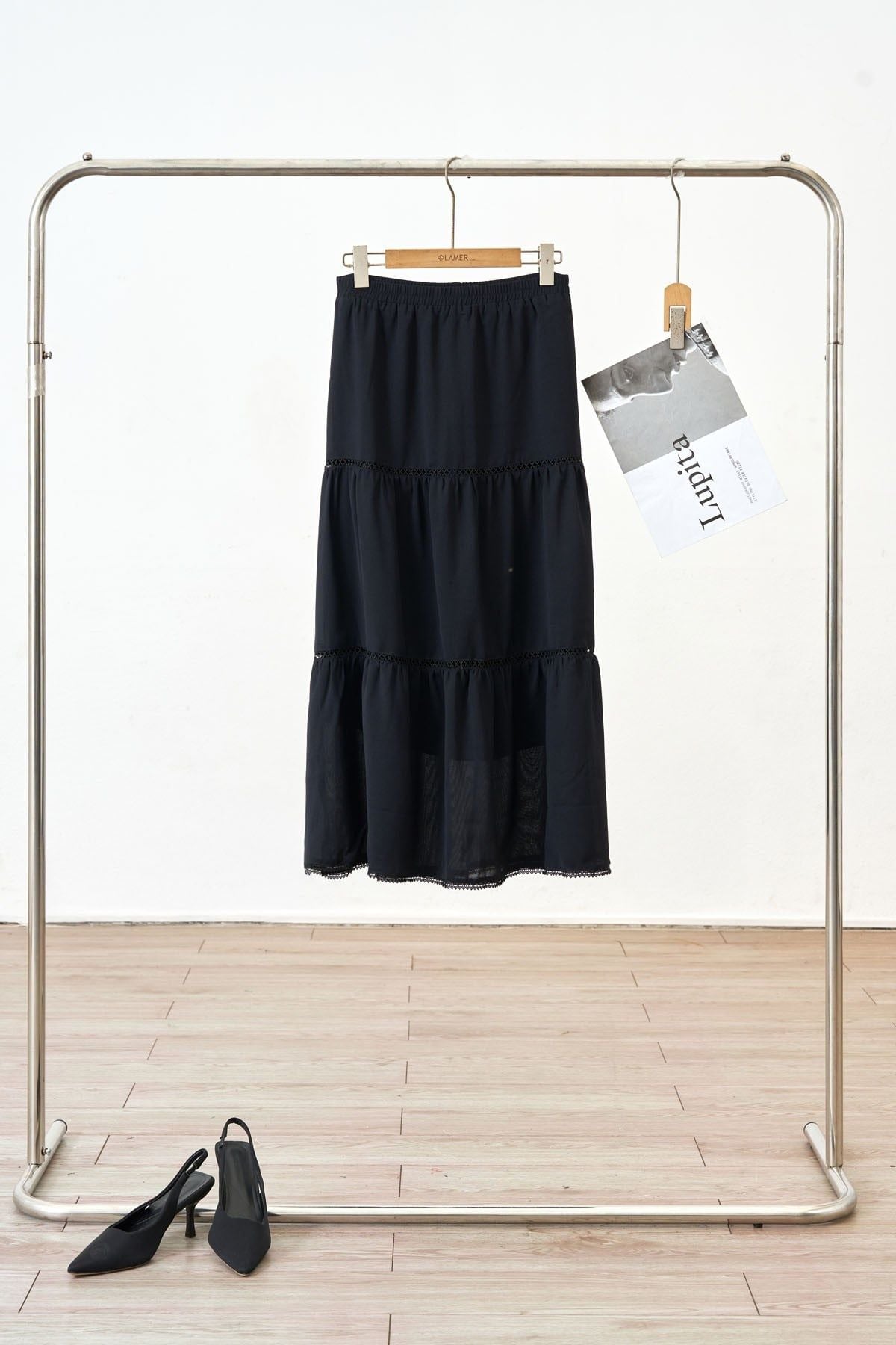 Chân váy xòe nhún kẹp zen - L62M25Q017