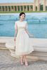 Đầm nhún xòe buộc nơ eo - L63L25H054