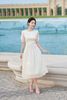 Đầm nhún xòe buộc nơ eo - L63L25H054
