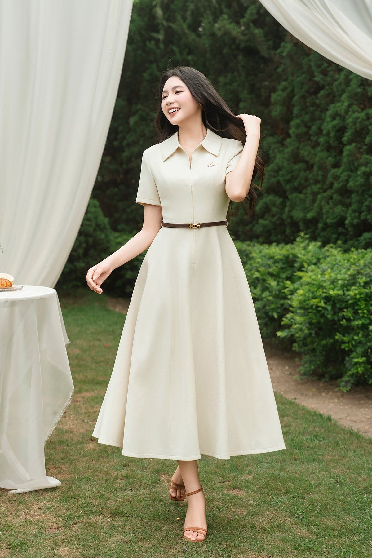 Đầm midi dáng xòe cộc tay thêu ngực - O63L26H008