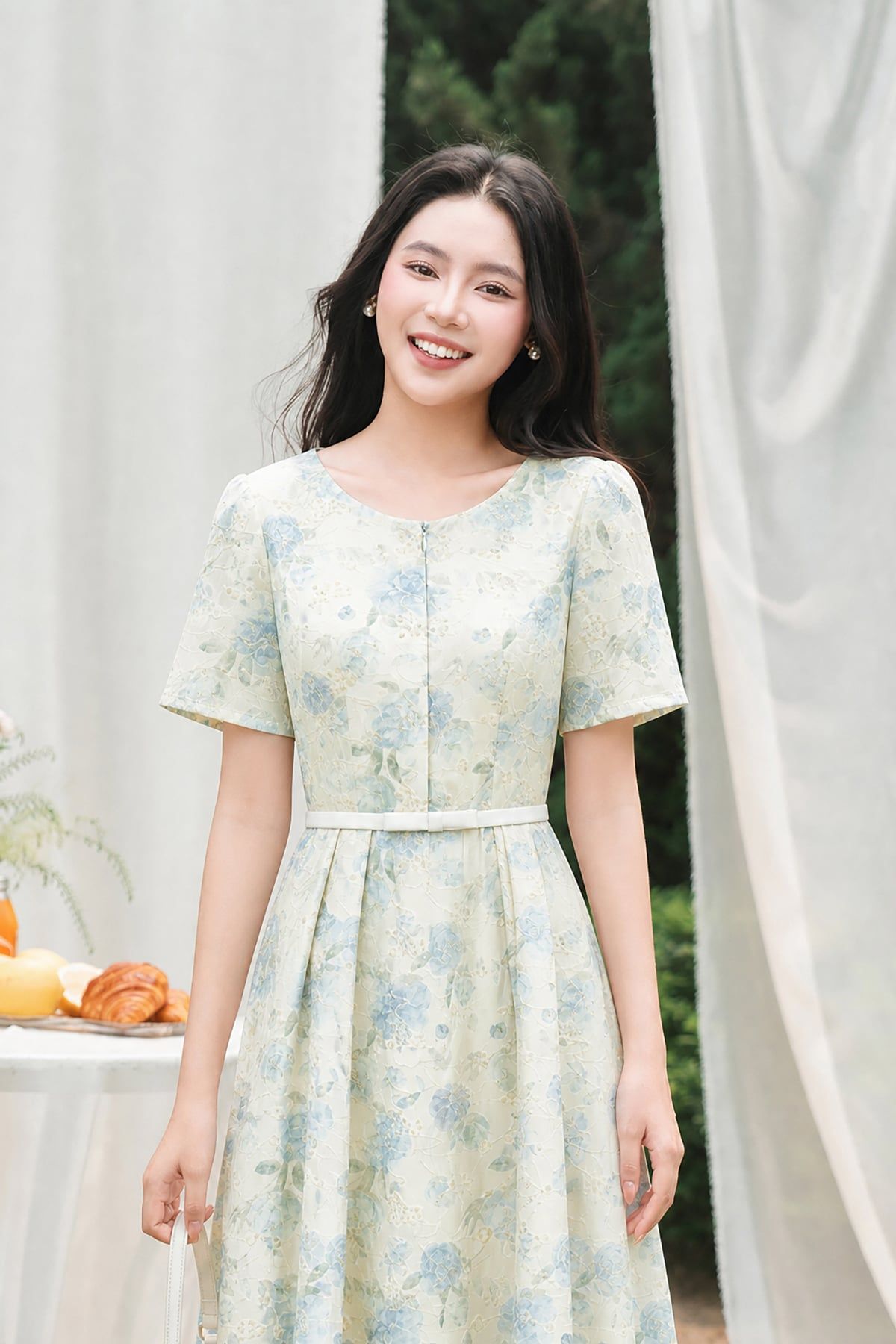 Đầm xoè cổ V cộc tay ly bung đai nơ eo - O63L26H029