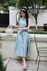 Đầm xòe nhún 3 tầng cổ phối - O63M26H013