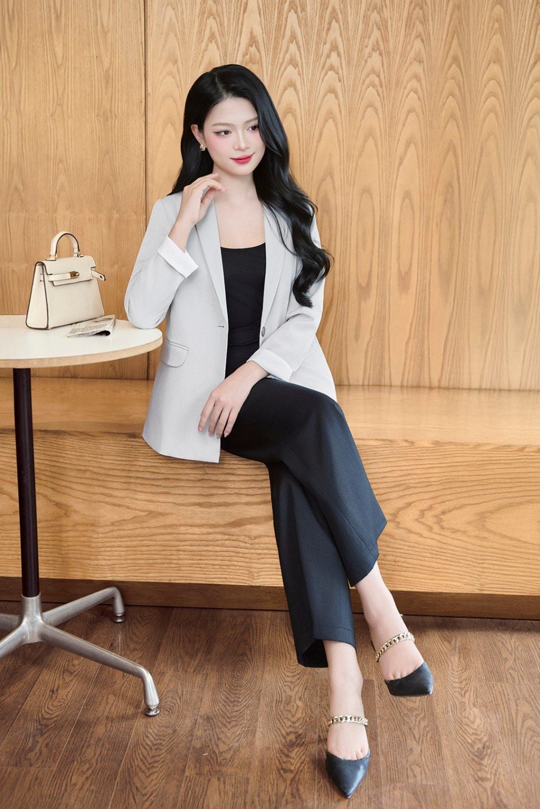 Quần ống rộng túi dọc đóng cúc - O64W25Q006