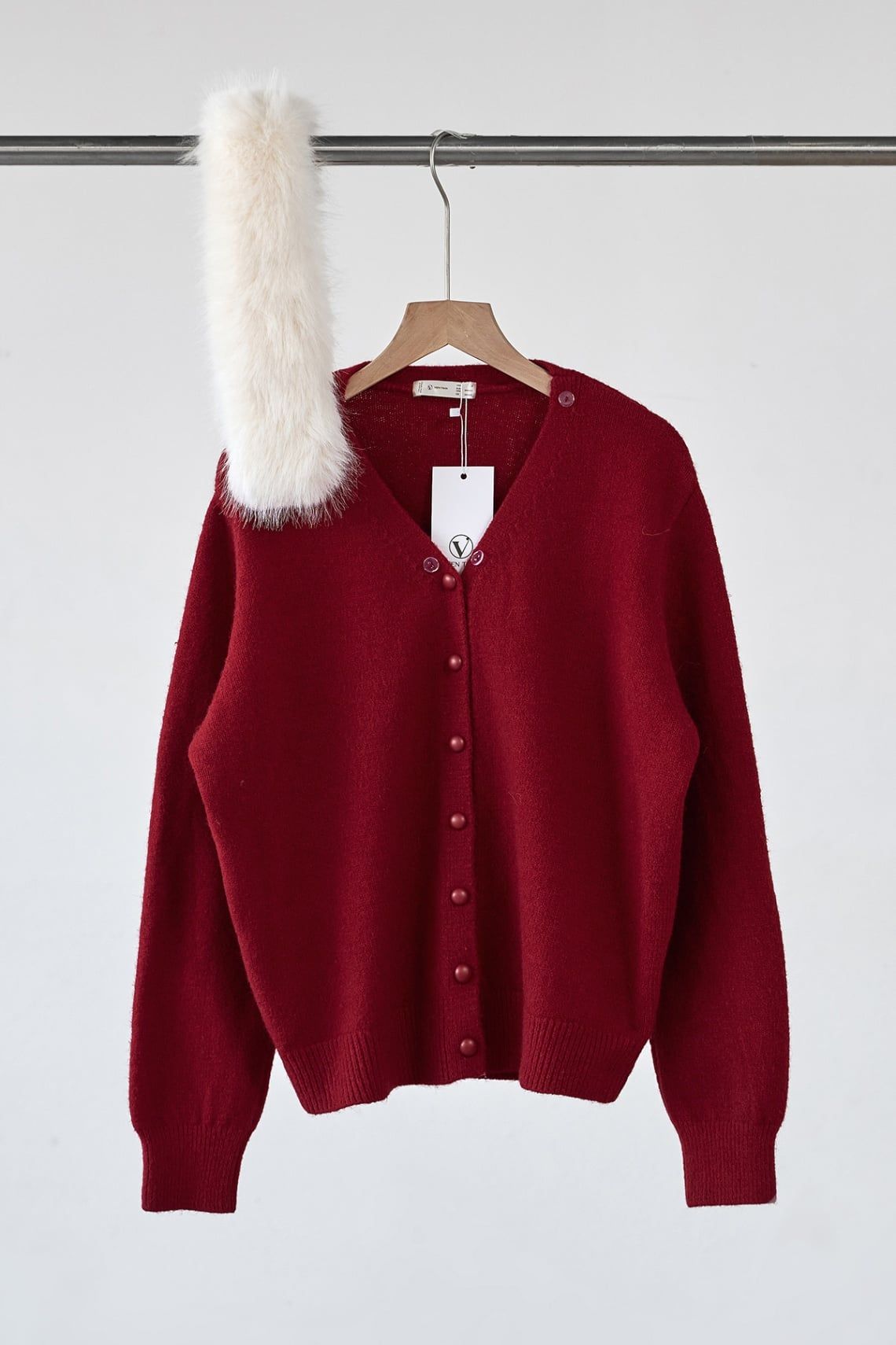 Áo khoác len trơn đóng cúc phối lông cổ - O65C25T012