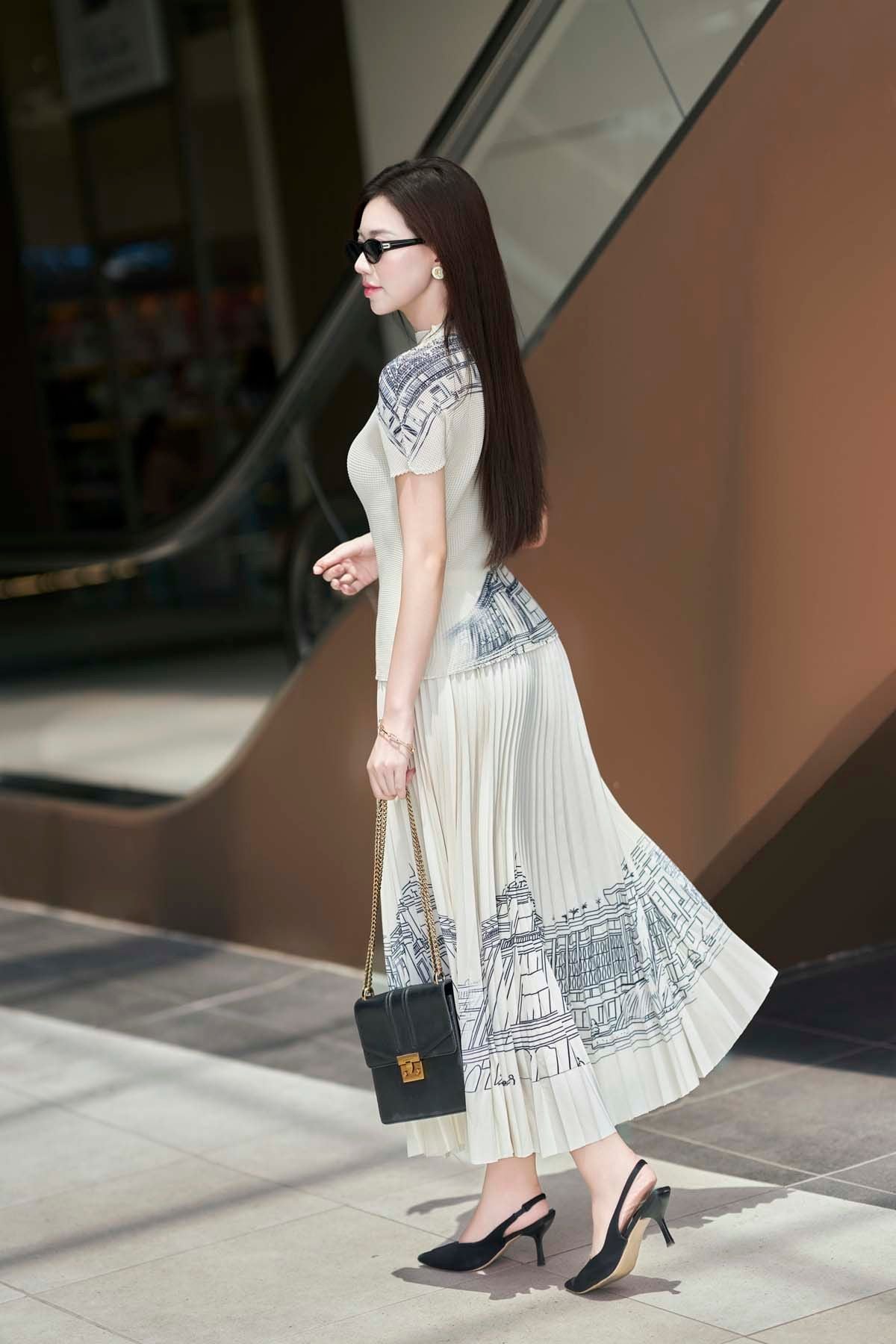 Set bộ áo nhăn tay ngắn và chân váy dài dập ly in hoạ tiết - S66C25Q001