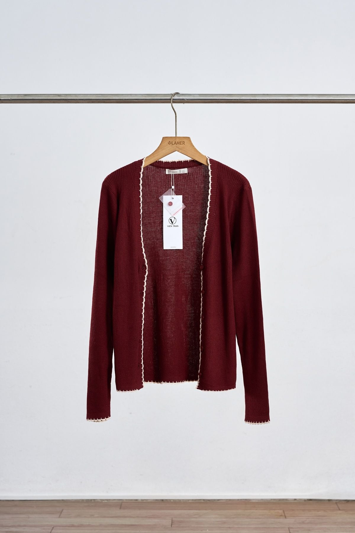 Áo len 2 dây phối viền đính nơ - V61B25T001