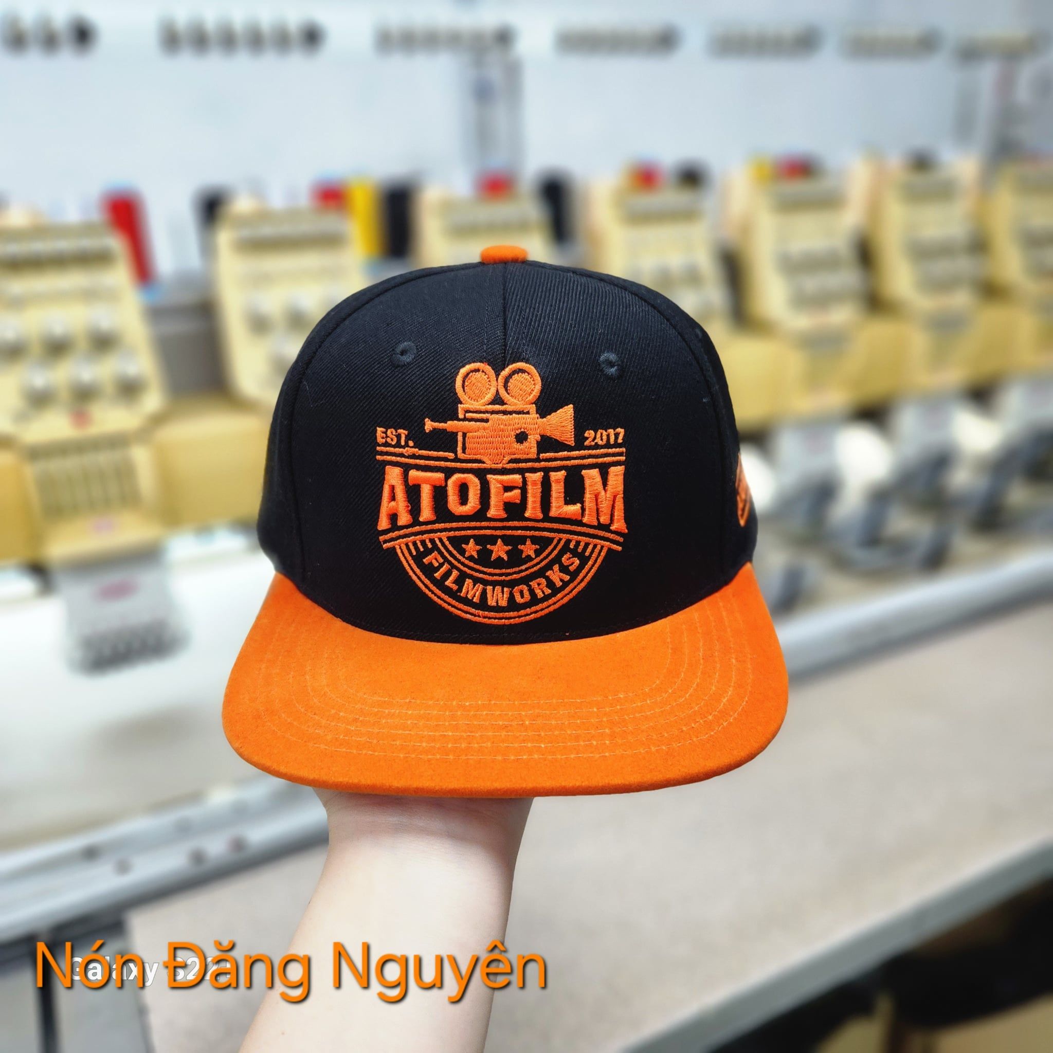  Nón snapback kaki Samsung đen cam thêu logo – SB02 