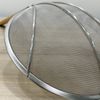 Chao lì inox cán gỗ