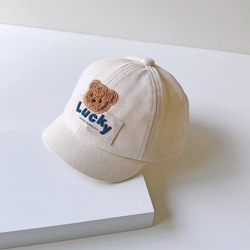 Mũ lưỡi trai cho bé bằng vải màu trắng