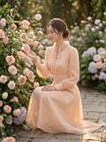  Đầm midi tay dài cổ hoa voan thắt nơ 