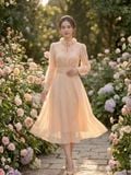  Đầm midi tay dài cổ hoa voan thắt nơ 