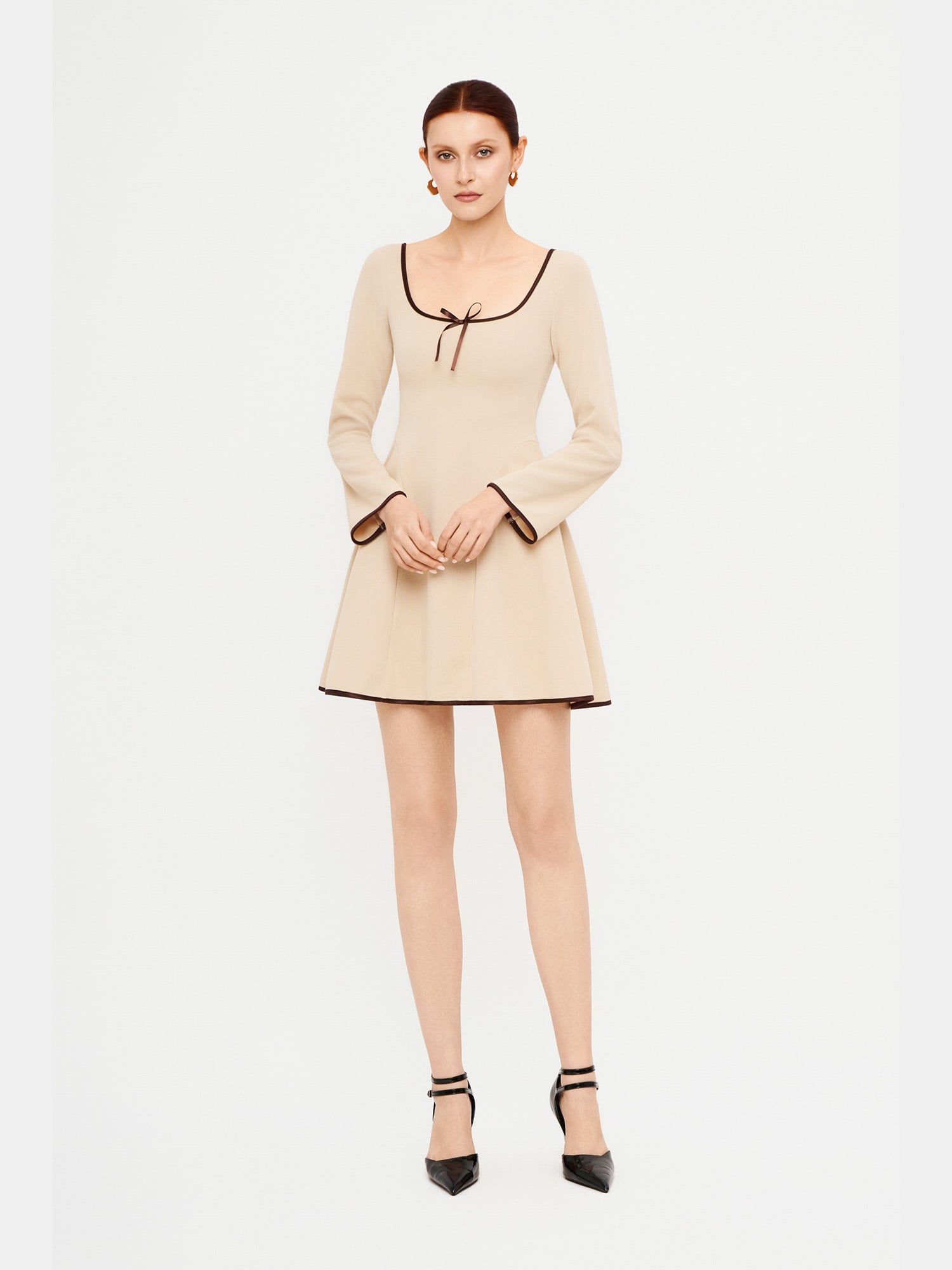 Đầm mini thun tay dài đính nơ