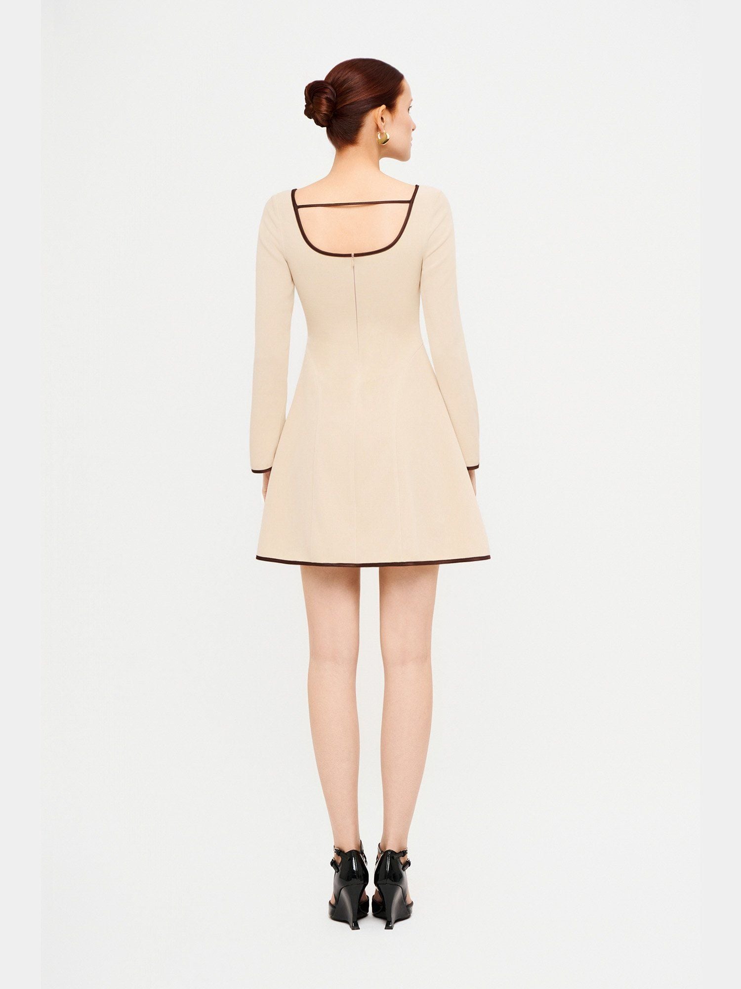  Đầm mini thun tay dài đính nơ 