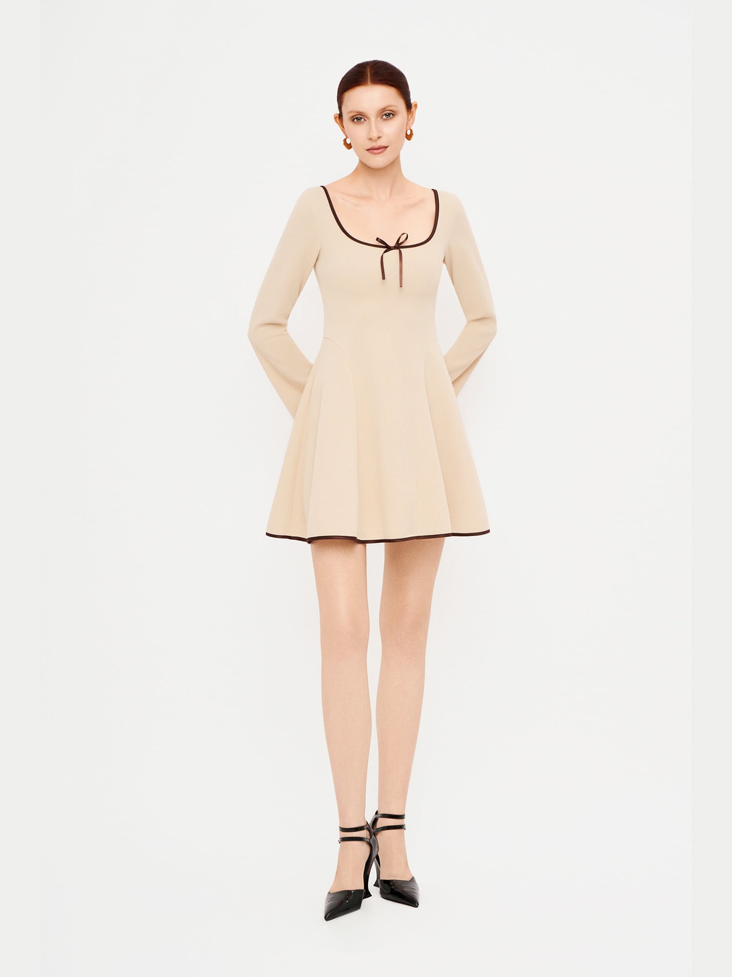 Đầm mini thun tay dài đính nơ