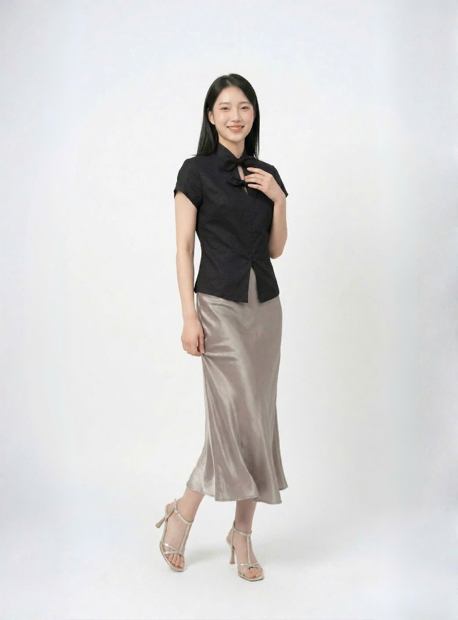 Áo linen chiết eo phối nơ cổ