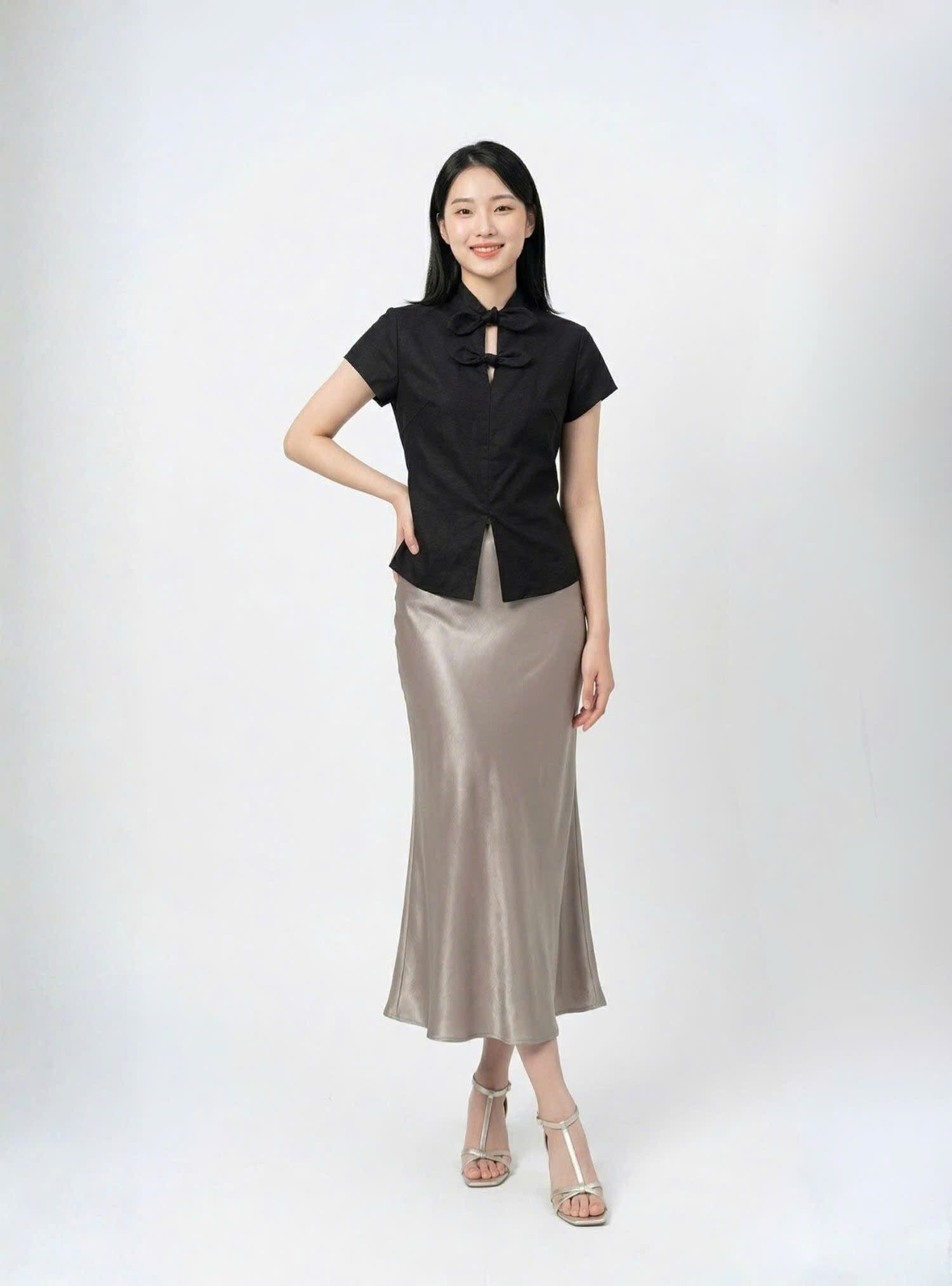 Áo linen chiết eo phối nơ cổ