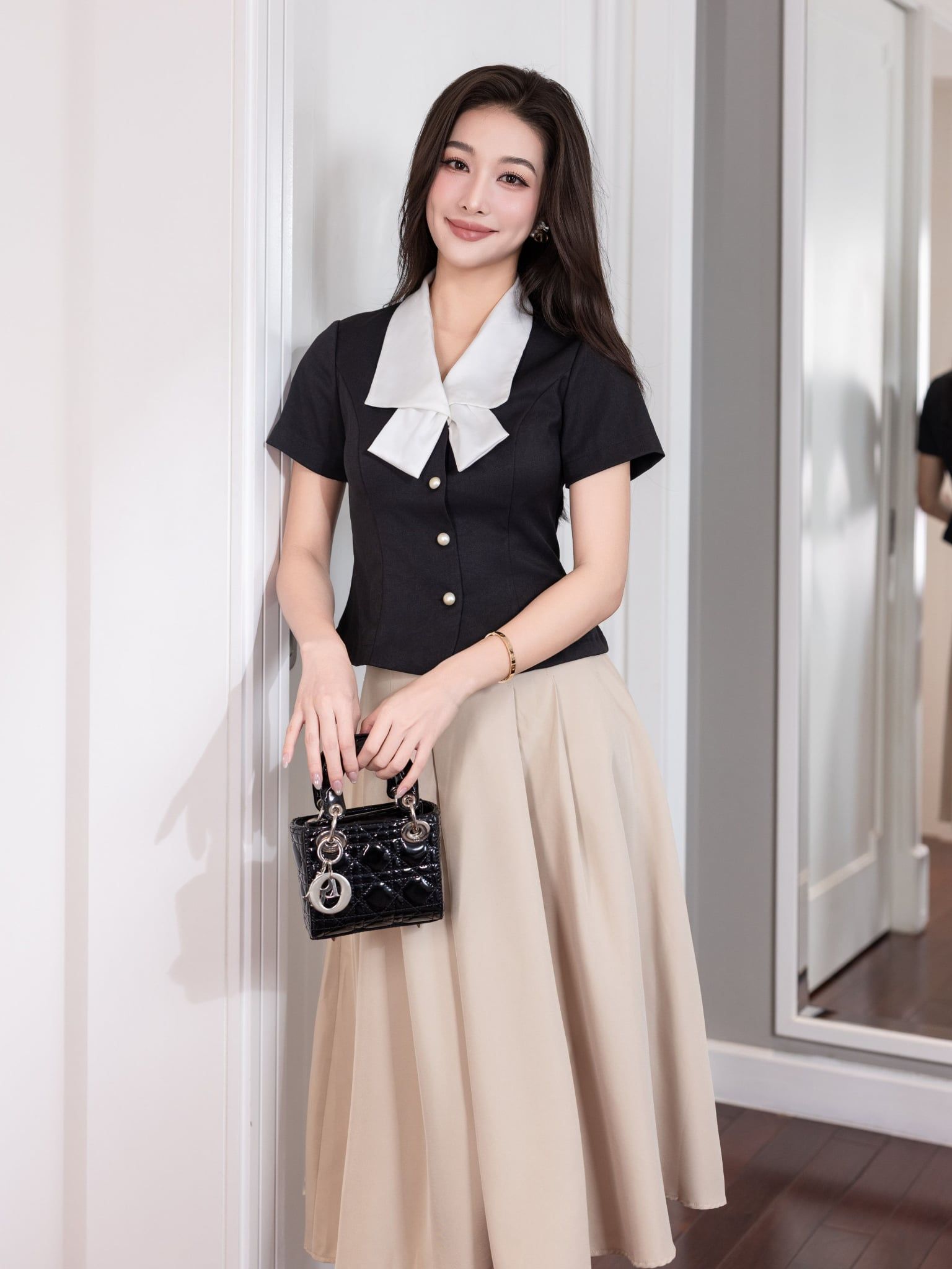  Áo kiểu peplum phối cổ nơ lụa 