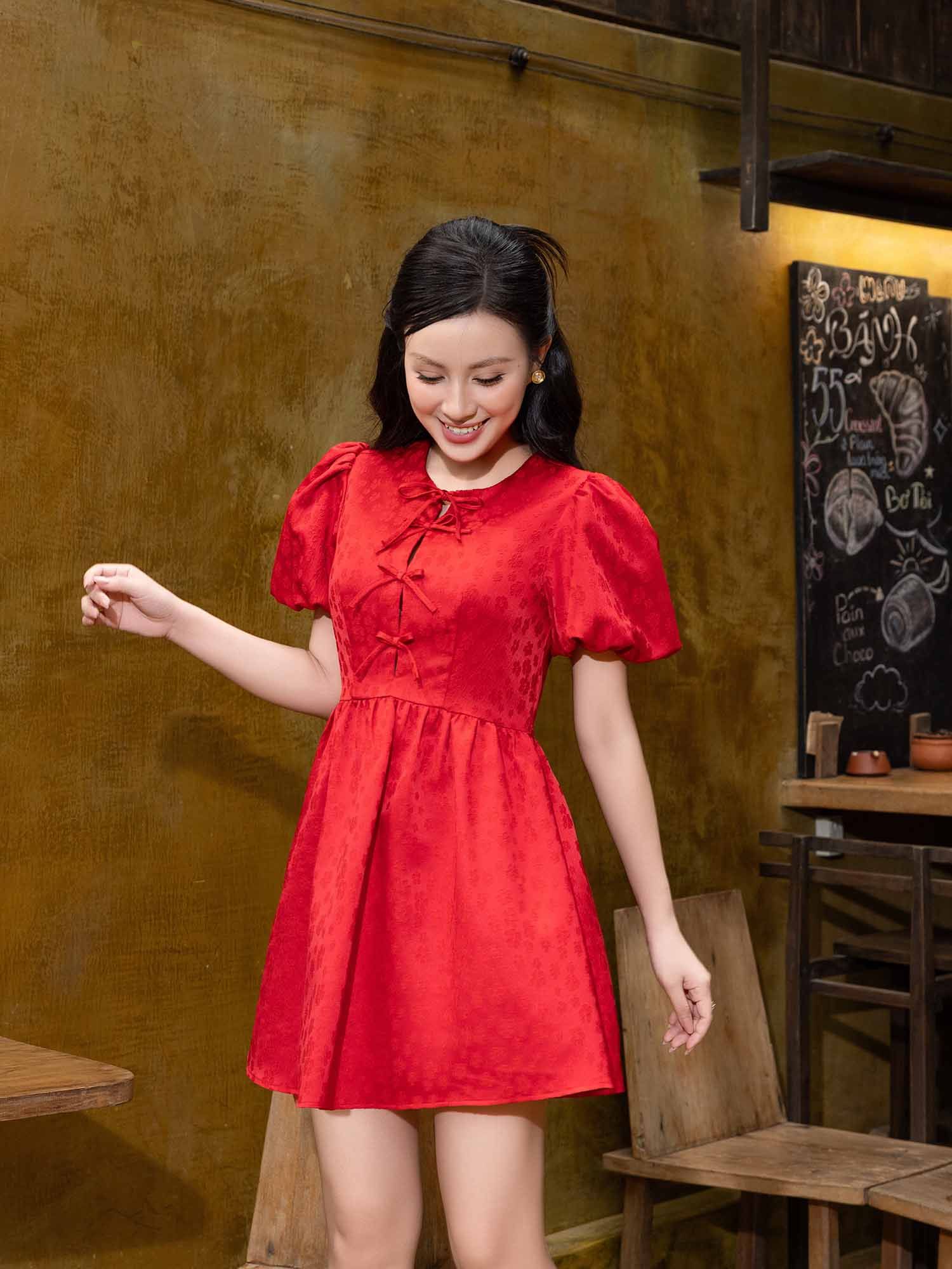  Đầm mini gấm tay phồng phối nơ 