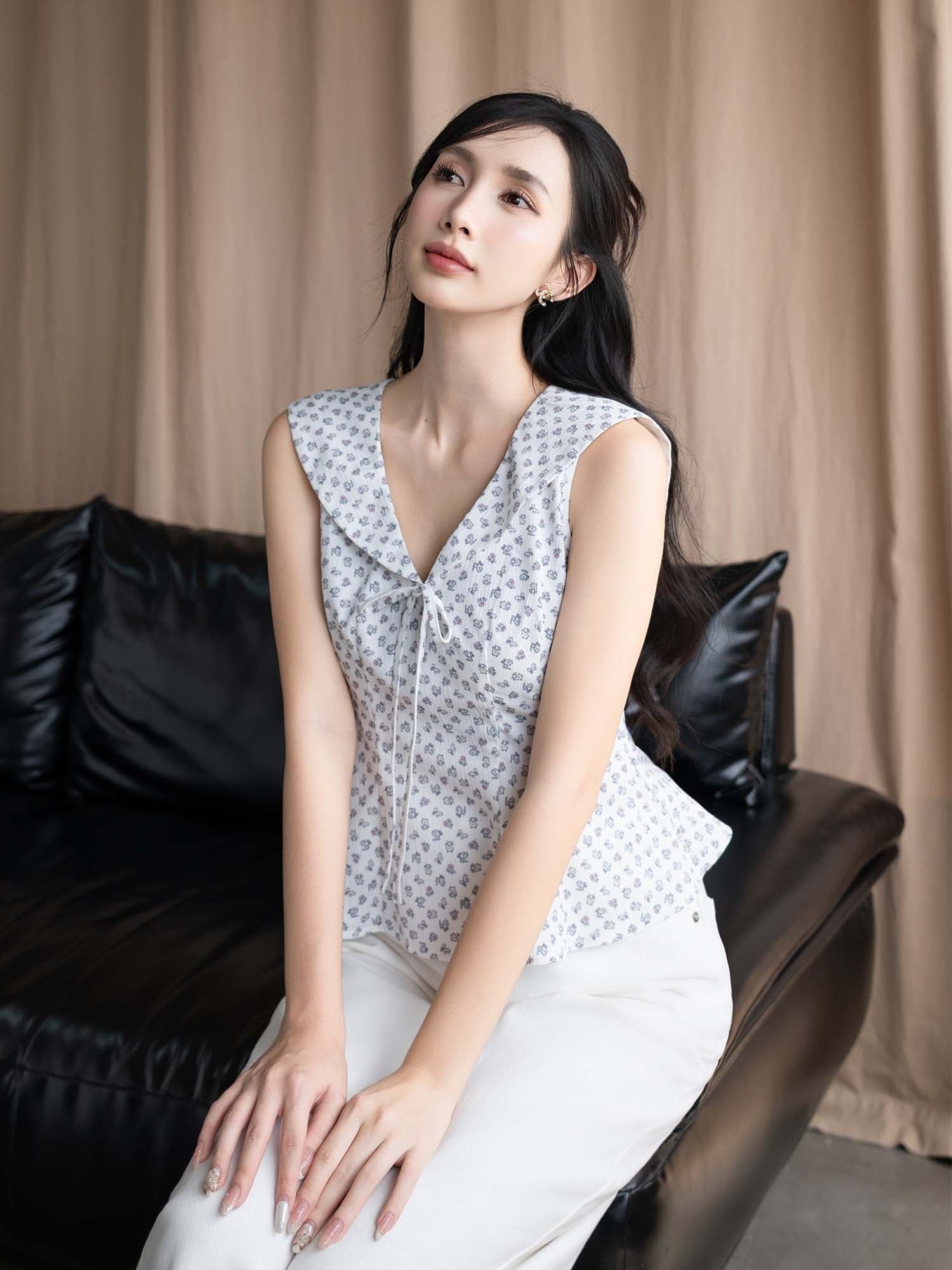 Áo kiểu đính nơ lai xòe cách điệu