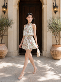 Đầm mini lụa in hoa cổ yếm 