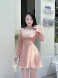  Đầm mini thun tay dài đính nơ 