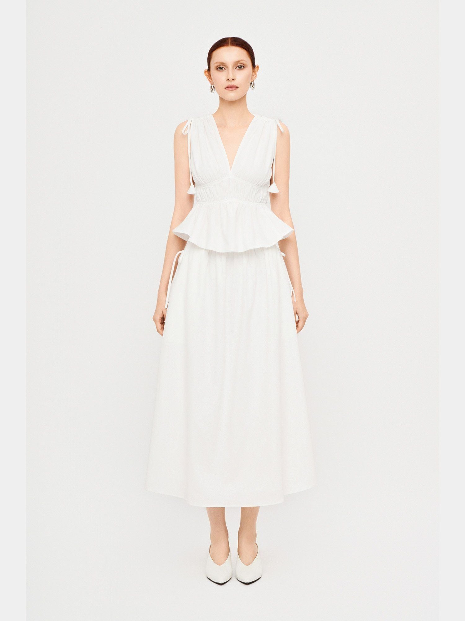  Chân váy dài lưng thun đính nơ hông 