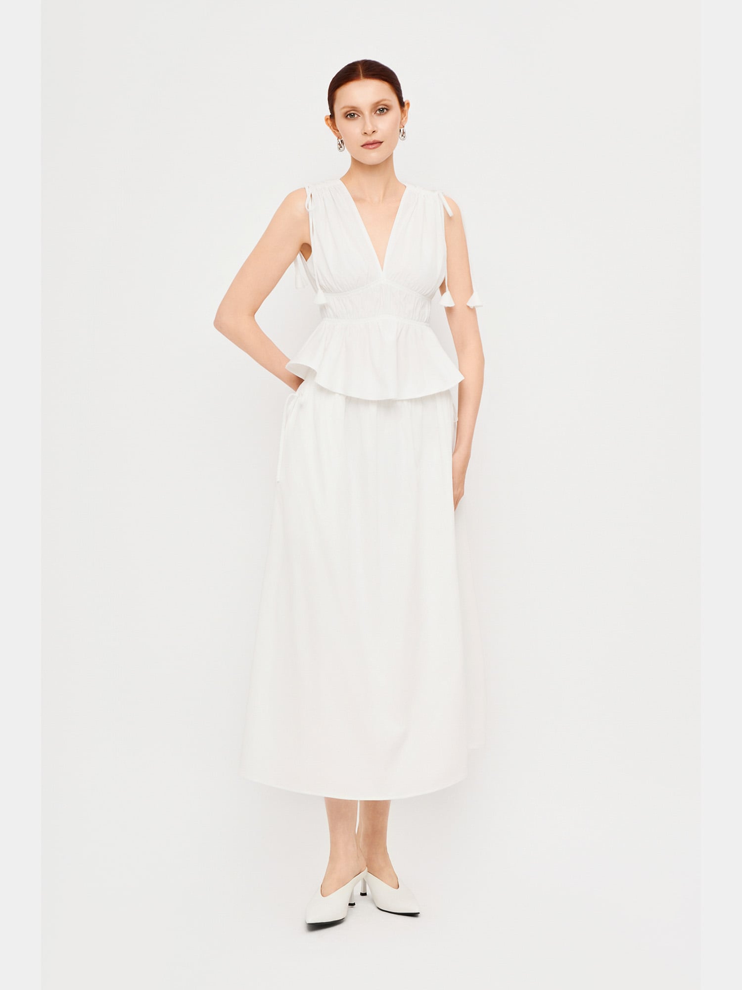 Chân váy dài lưng thun đính nơ hông