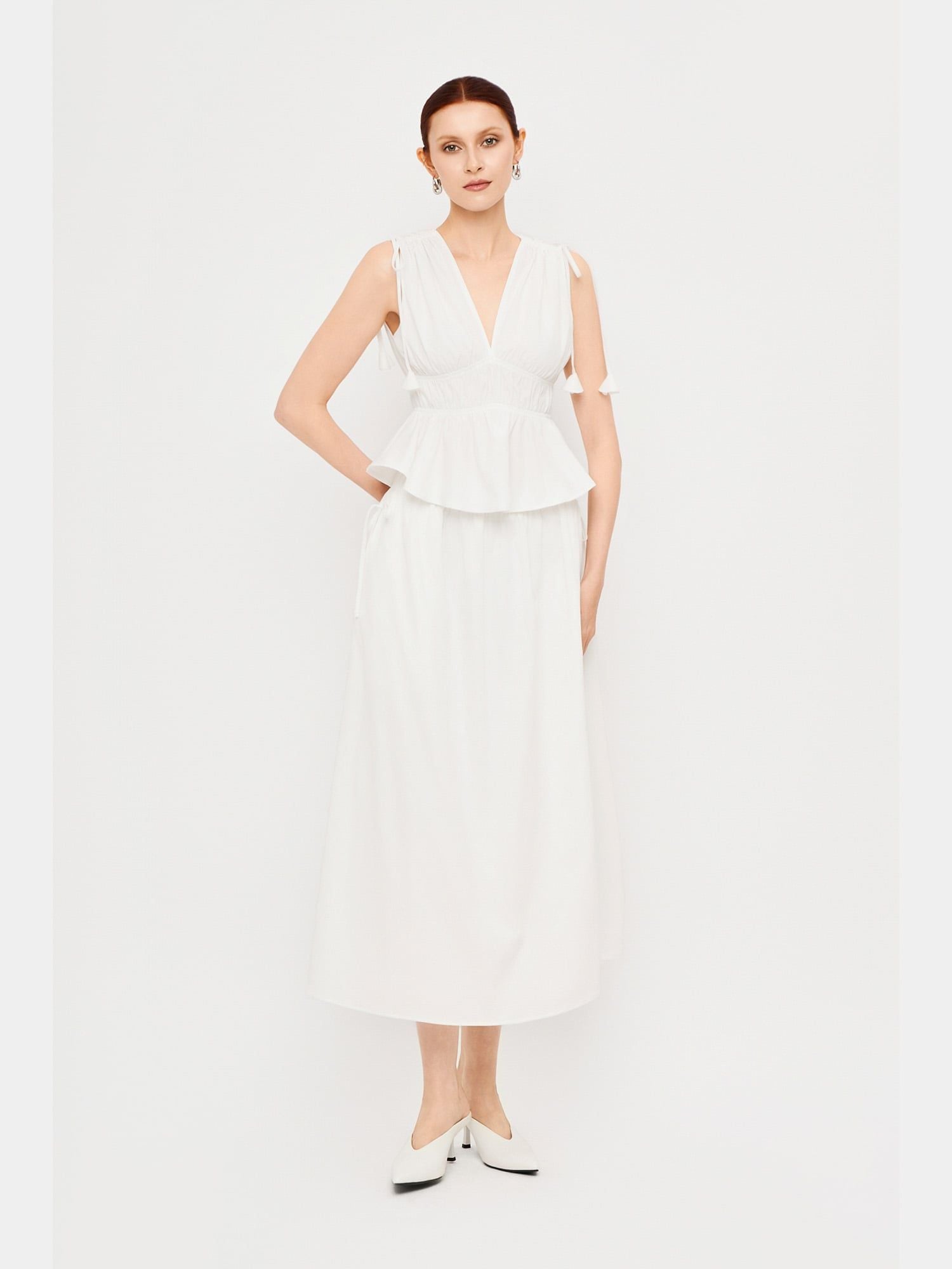  Chân váy dài lưng thun đính nơ hông 