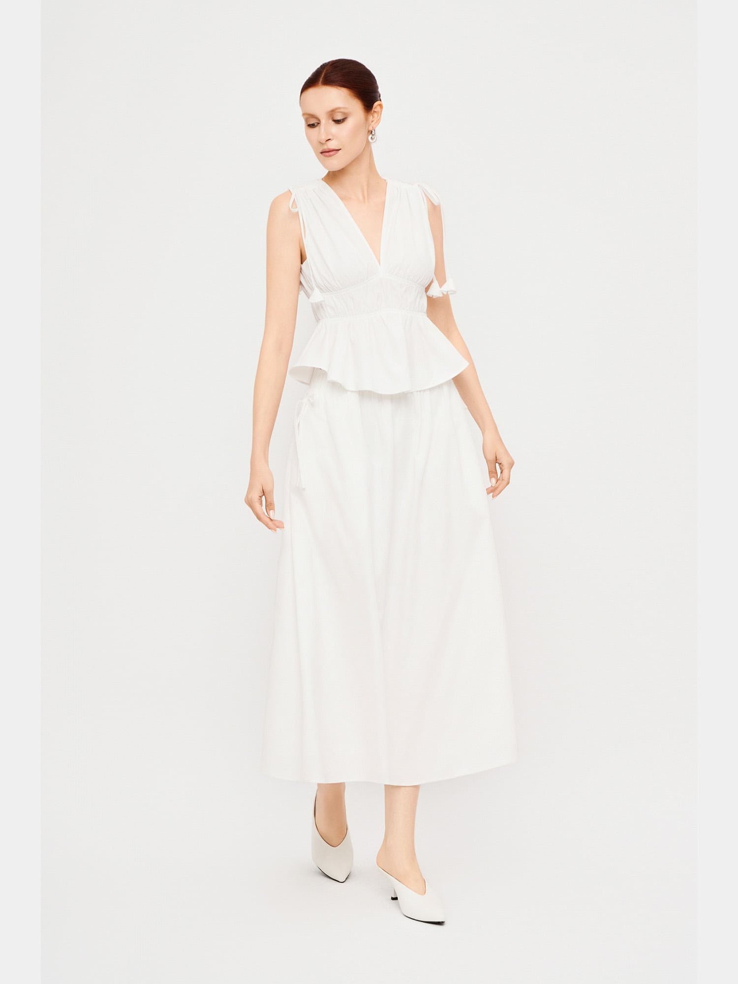 Chân váy dài lưng thun đính nơ hông