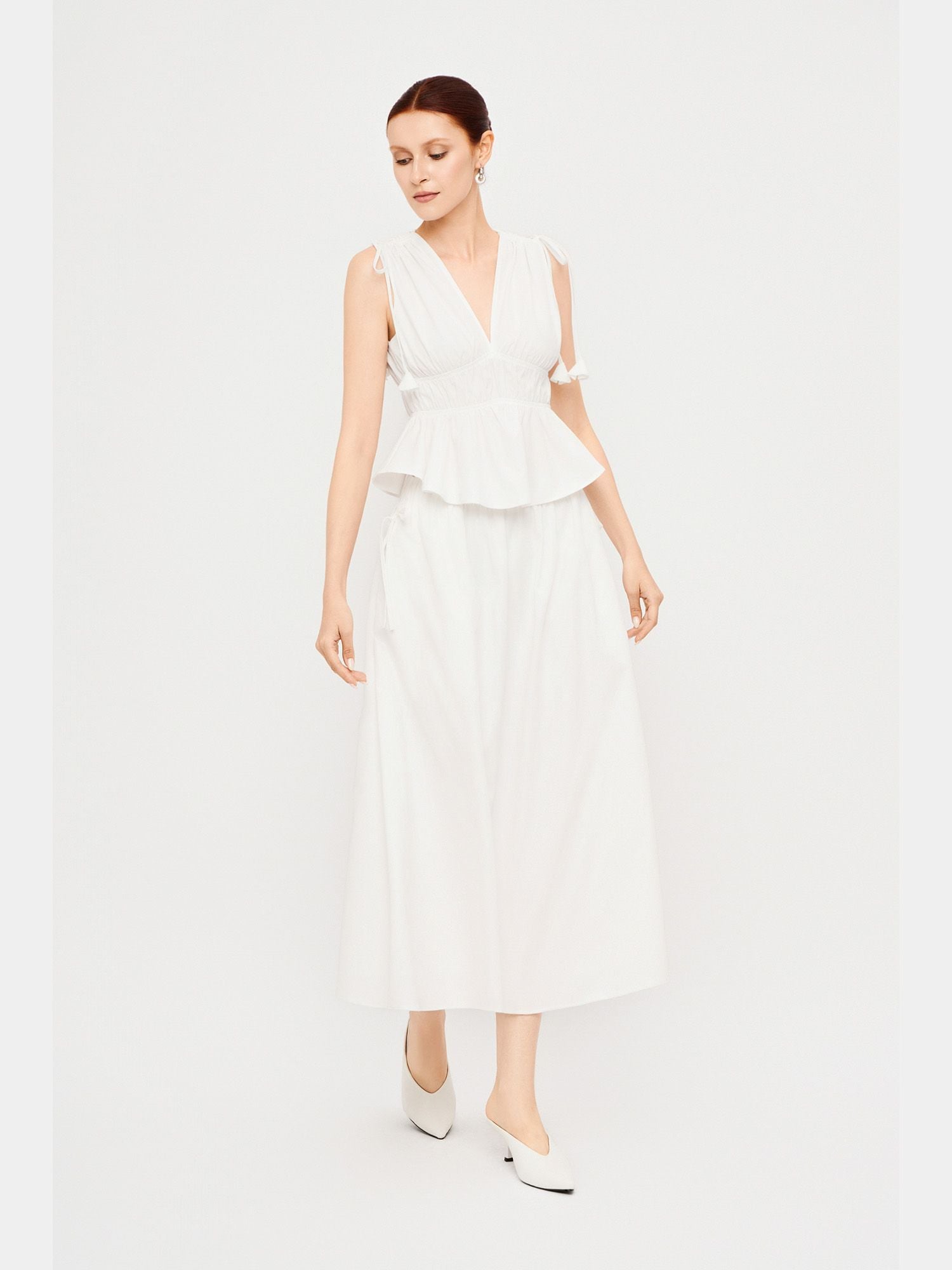  Chân váy dài lưng thun đính nơ hông 