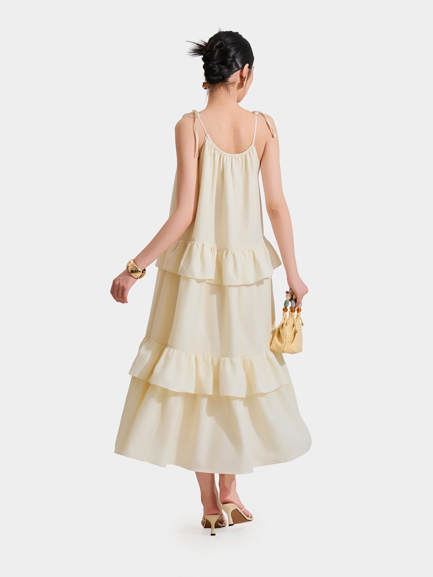  Đầm maxi cổ yếm thắt nơ ba tầng 